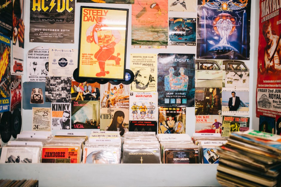 Pop music posters and records in a vinyl record shop